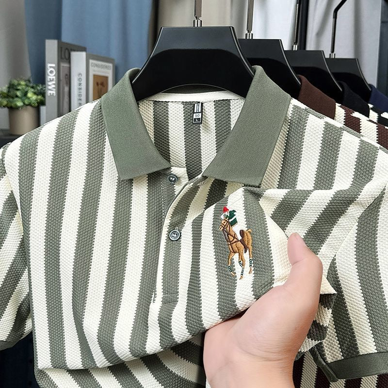 Striped polo shirt with embroidered logo on a hanger